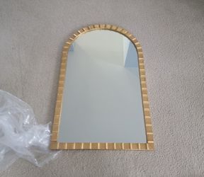 beautiful brand new 24 by 38.75 inch decorative mirror.  (MUST SELL TODAY)