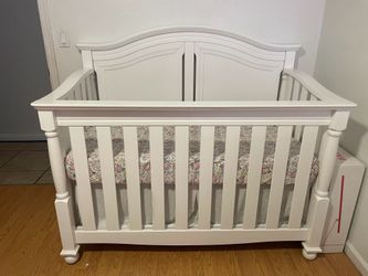 White baby crib