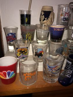 130+ shot glass collection.