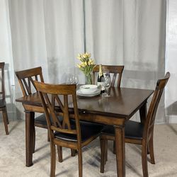 Ashley Extendable Dining Table & 6 Chairs PERFECT FOR EVERYDAY USE WITH THE CONVENIENCE OF EXTENDING 