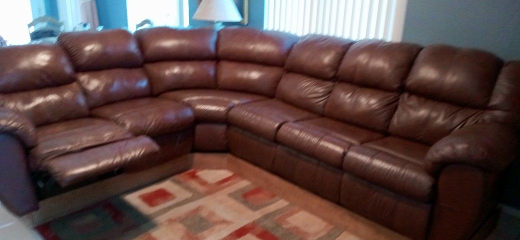 Leather Sectional. Queen Sleeper Never Used. Non Smoker