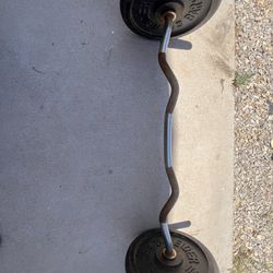 Curl Bar And 50 Pounds Of Weight