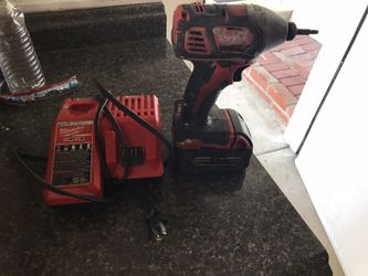 Milwaukee drill charger and battery