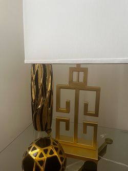 A set of gold lamps