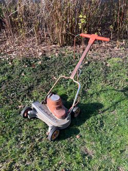 vintage Black & Decker electric lawn mower.