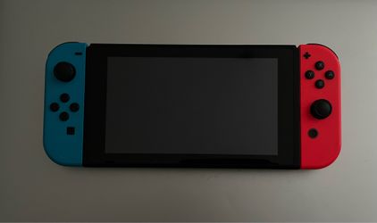 Nintendo Switch V2 with MY TOMODACHI LIFE and other games