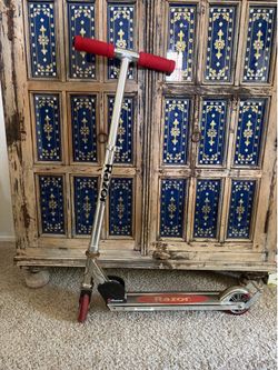 Red razor scooter