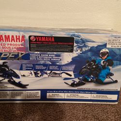 Black/blue APEX Yamaha Snow Bike