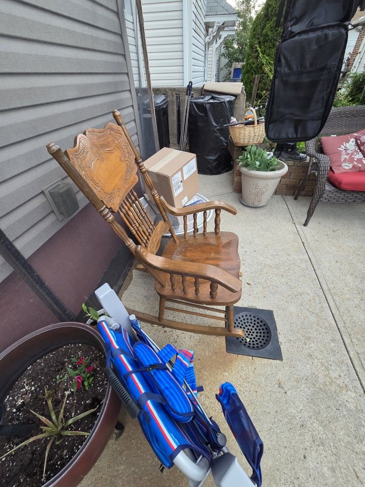 Old Hand Craving Rocking Chair