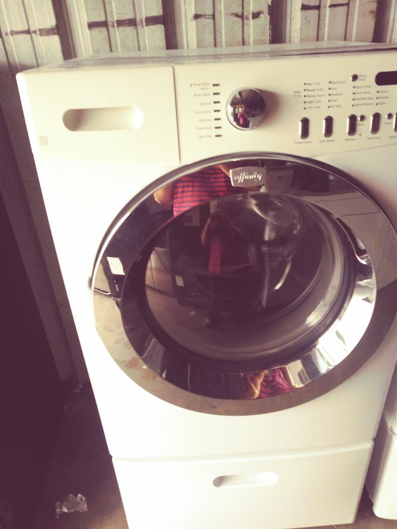 Front load washer with pedestal