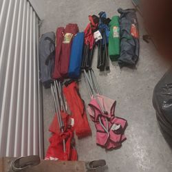 Lots Of Folding Chairs  And Drinks Table 