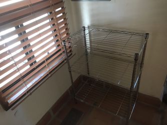 Three tier adjustable rack