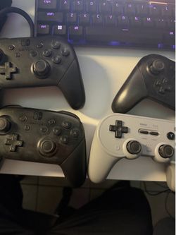 Oled Nintendo switch with 4 controllers