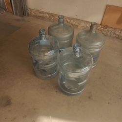 FREE.  FREE.    4  WATER JUGS 