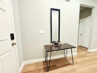 Mirror with entry table