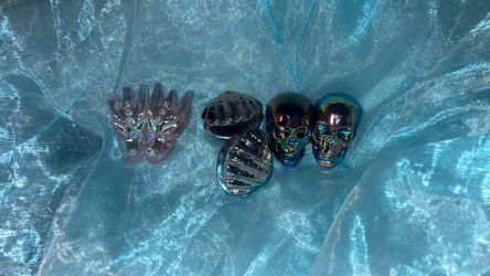 Iridescent quartz crystal carvings