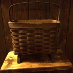 Vintage footed magazine basket