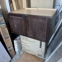 Kitchen cabinet for top refrigerator size  33 w x  18 H x 24 d     We  new open box just get dirty  good condition no dents no cracks we asking only $