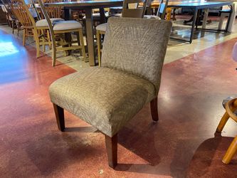 Tan Upholstered Armless Chair with Gold Metallic Sheen