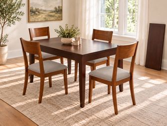 Beautiful dark wood dining room table, 4 chairs and a leaf