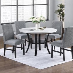 White Dining Table With Gray Corduroy Chairs 