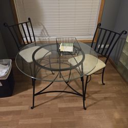 Glass Table And Two Chairs
