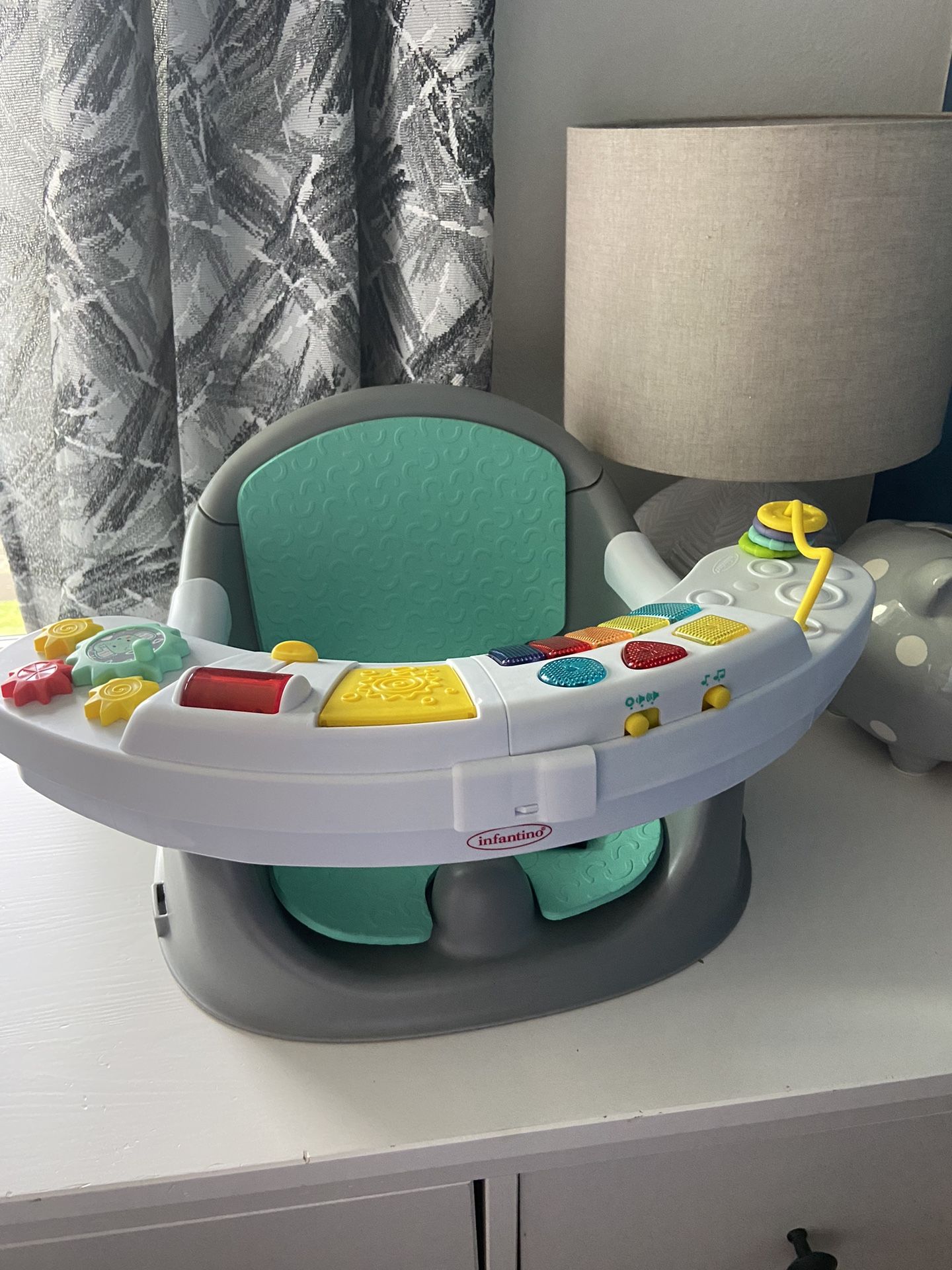 Infantino Music & Lights 3-in-1 Discovery Seat & Booster
