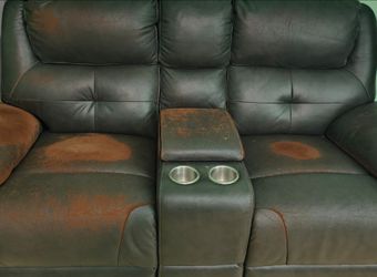 Reclining sofa and loveseat set.