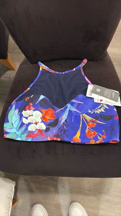 Really nice Athleta bikini top size XL. Blue tropical floral print and navy mesh paneling .