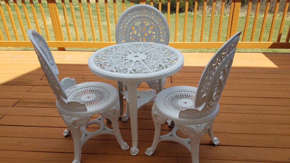 PATIO TEA TABLE WITH THREE CHAIRS