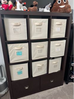 9 cube shelf with fabric bins and 3 drawers