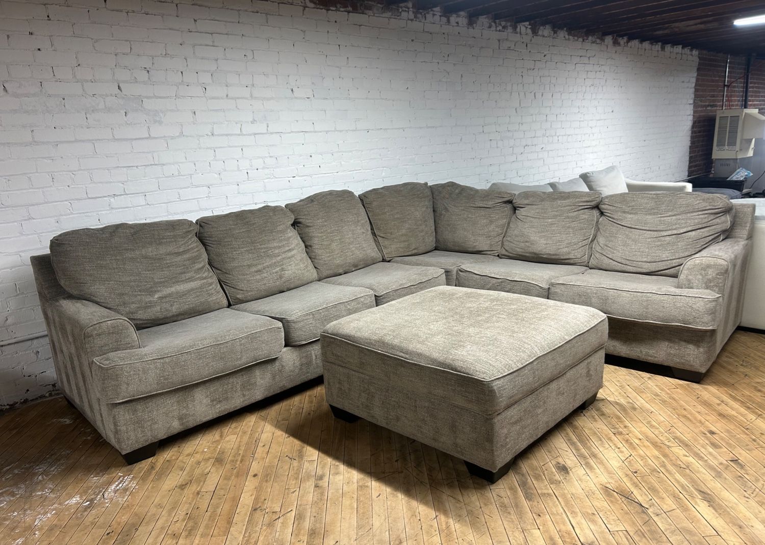 Free delivery Ashley sectional couch and ottoman