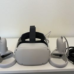 Meta Quest 2 VR Headset With Charging Head Strap, Upgraded Cushion Face Shield, Upgraded Controller Grips, And Link Cable