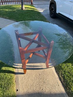 Glass top dining table