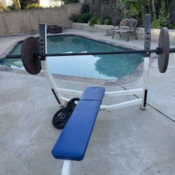 Flat Bench,  Rack , Olympic Bar And Weights💪🏼