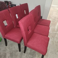 6 Red Cloth Dining Chairs 200.00