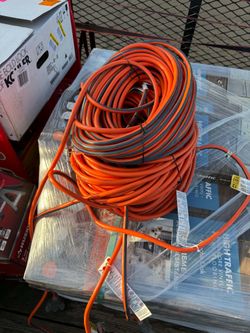 RIDGID
100 ft. 12/3 Heavy Duty Indoor/Outdoor Extension Cord with Tritap Lighted End, Orange/Grey