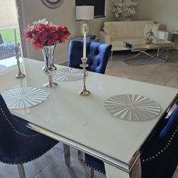 Dining table with 6 chairs.