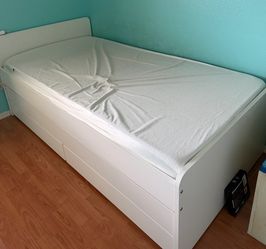 White trundle bed with drawers