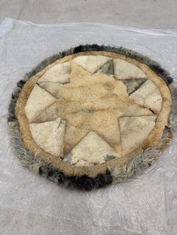 Old lamb rug with wood trim