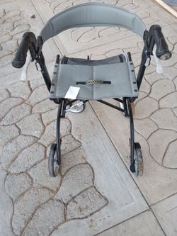 Walker with seat ( folds)