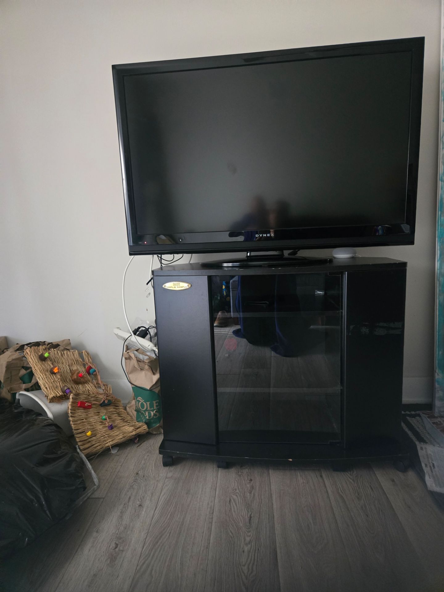 Black TV Stand with TV for sale.