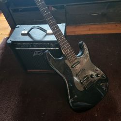 Black Squire Electric Guitar And Peavey Amp