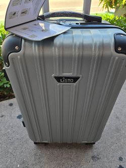 26" Travel Suitcase 8. Wheels Spinner Hard Shell New With Tags Tsa Lock Extra Lightweight Expandable Waterproof Silver Color