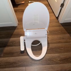 SK magic BID-018D Electric Bidet Toilet Seat Elongated| Adjustable Warm Water, Warm Air Dryer| 360° Self-Cleaning Nozzle| Easy Installation| Heated To