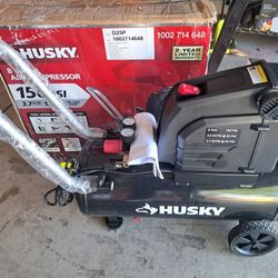Husky8 Gal.​ 150 PSI Portable Electric Oil-​Free Horizontal Hotdog Air Compressor with Rubber Wheels and 1-​Quick Coupler