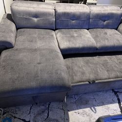 Taylor Sectional  with Pullout Bed, Chaise Storage, and Ottoman!