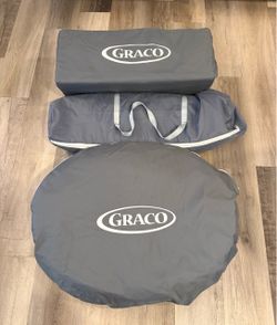 Graco Pack 'n Play with Bassinet and Canopy.