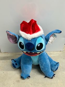 Disney Stitch holiday greeter plush toy,