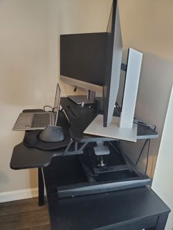Height adjustable standing desk with complimentary table